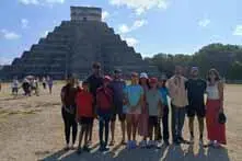 Tourists enjoying the guide's explanation